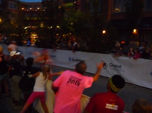 Dad and Sam cheering me on down the finish shoot...yes, that blur is me :)