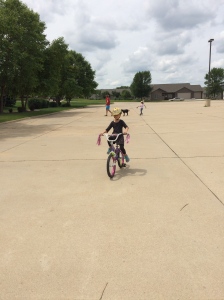 Teaching the twins how to ride their bikes without training wheels!